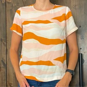 Fun and cute blouse you can dress up for work or keep it casual.